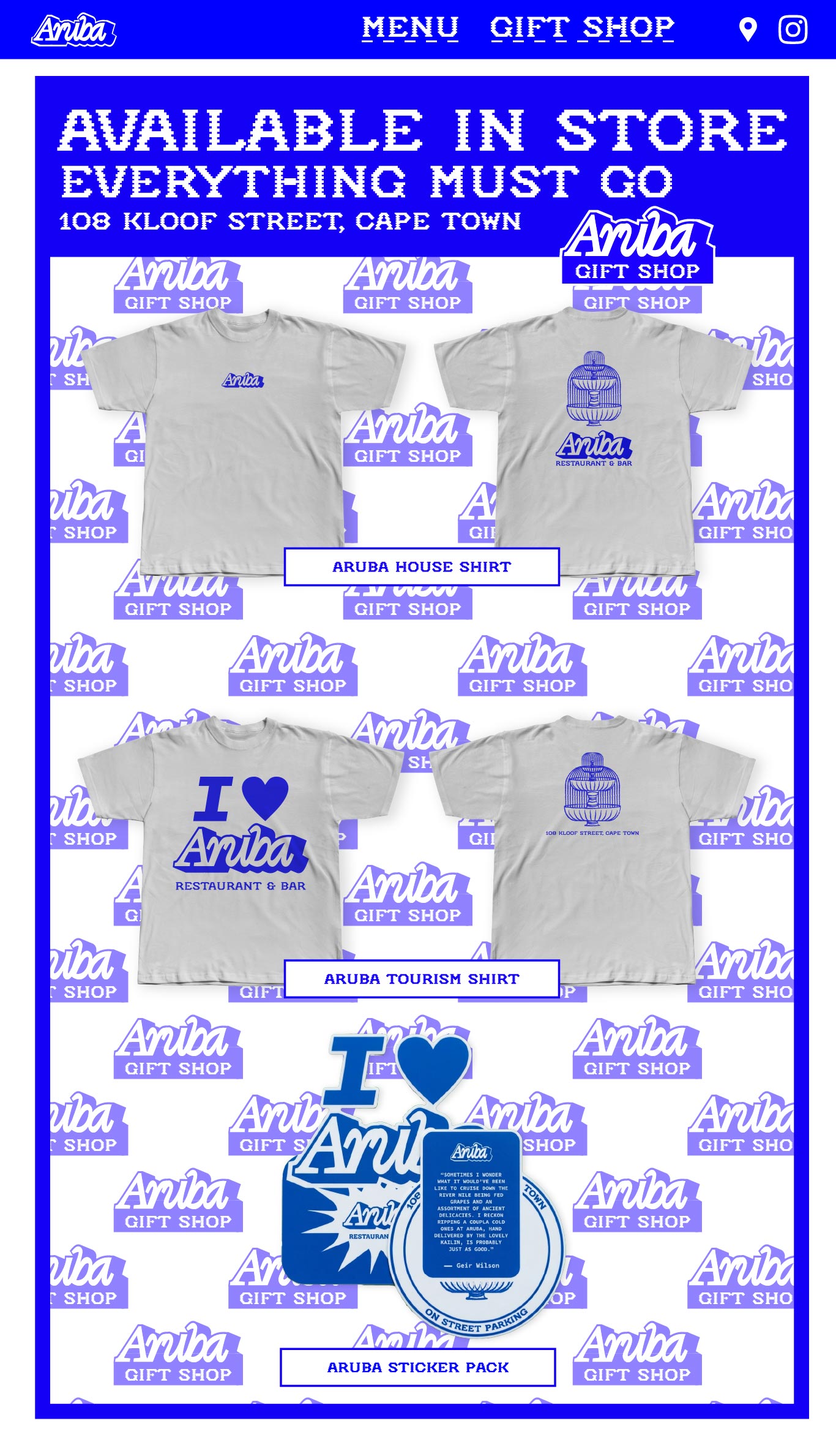 Aruba gift shop products available in store at 108 Kloof Street, Cape Town, including shirts and a sticker pack.